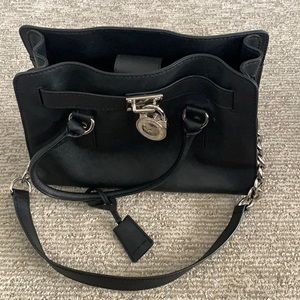 Michael Kors. Black tote handbag.